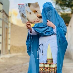 Portrait of Hosna Fazily, an Afghan woman in a blue hijab and white coat with a stethoscope, holding and reading a medical pamphlet in Dari. The image represents her reflection on her path from medicine to photography.